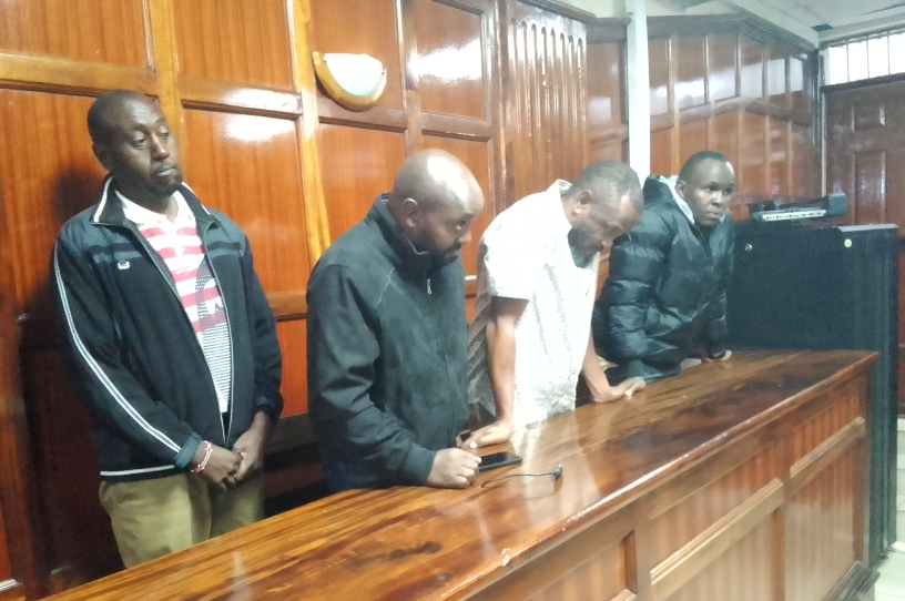 From Left, Douglas Macharia Maina,Dominic Kimotho, Enan Njuguma Mweha and Lewis Masaku when they were charged at a Nairobi court with stealing. PHOTO/Kibochi Karanja