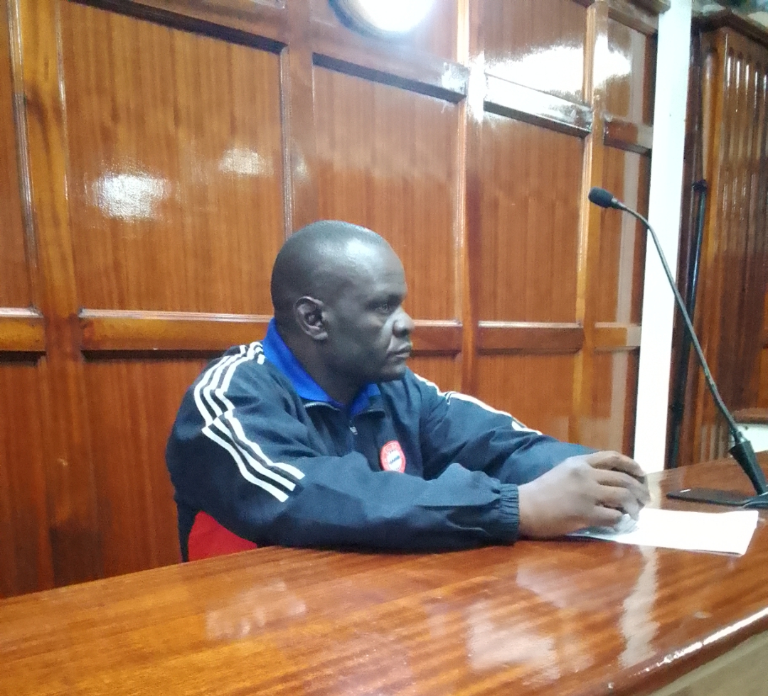 Geofrey Juma Opala a Visa Oshwal Primary School swimming pool attendant when he was arraigned before court in a miscellaneous application to be held in Custody. PHOTO/Kibochi Karanja.